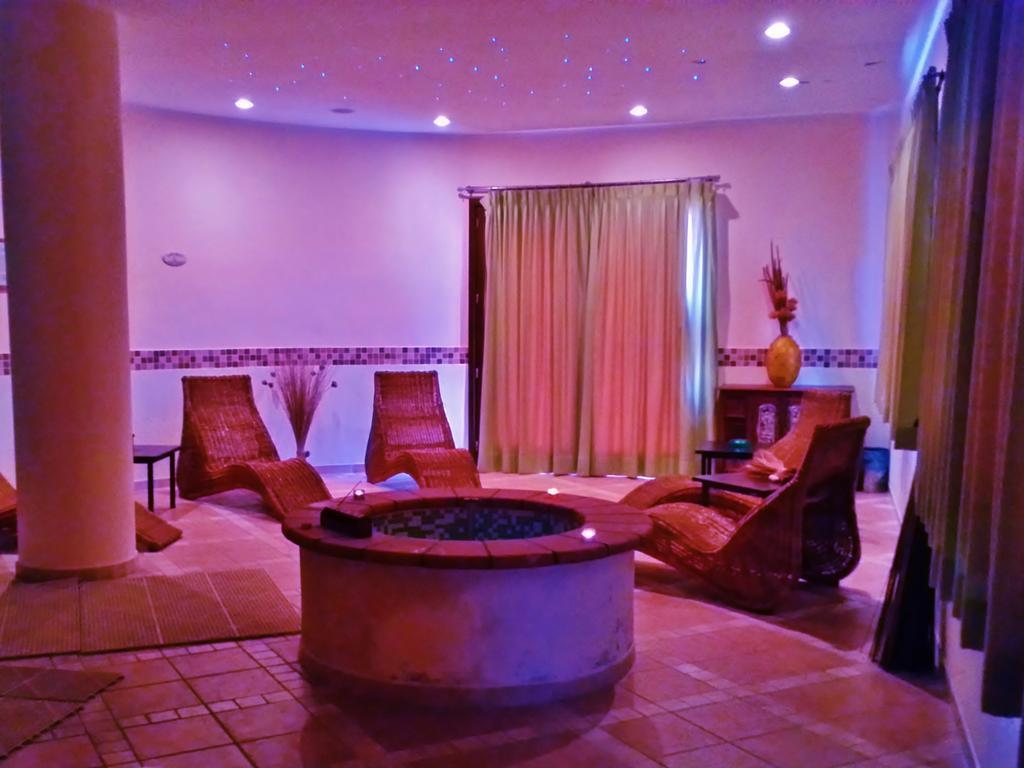 فيلابوتزو Residence Il Borgo Di Porto Corallo الغرفة الصورة