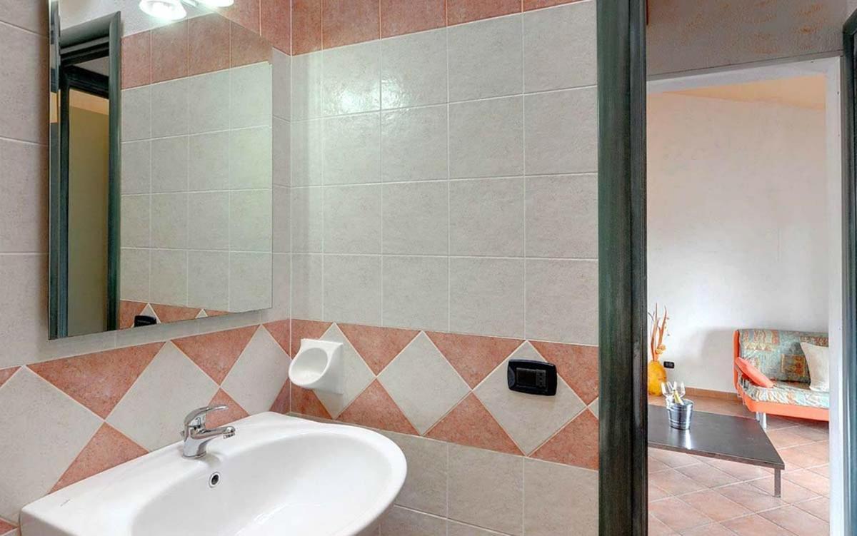 فيلابوتزو Residence Il Borgo Di Porto Corallo المظهر الخارجي الصورة
