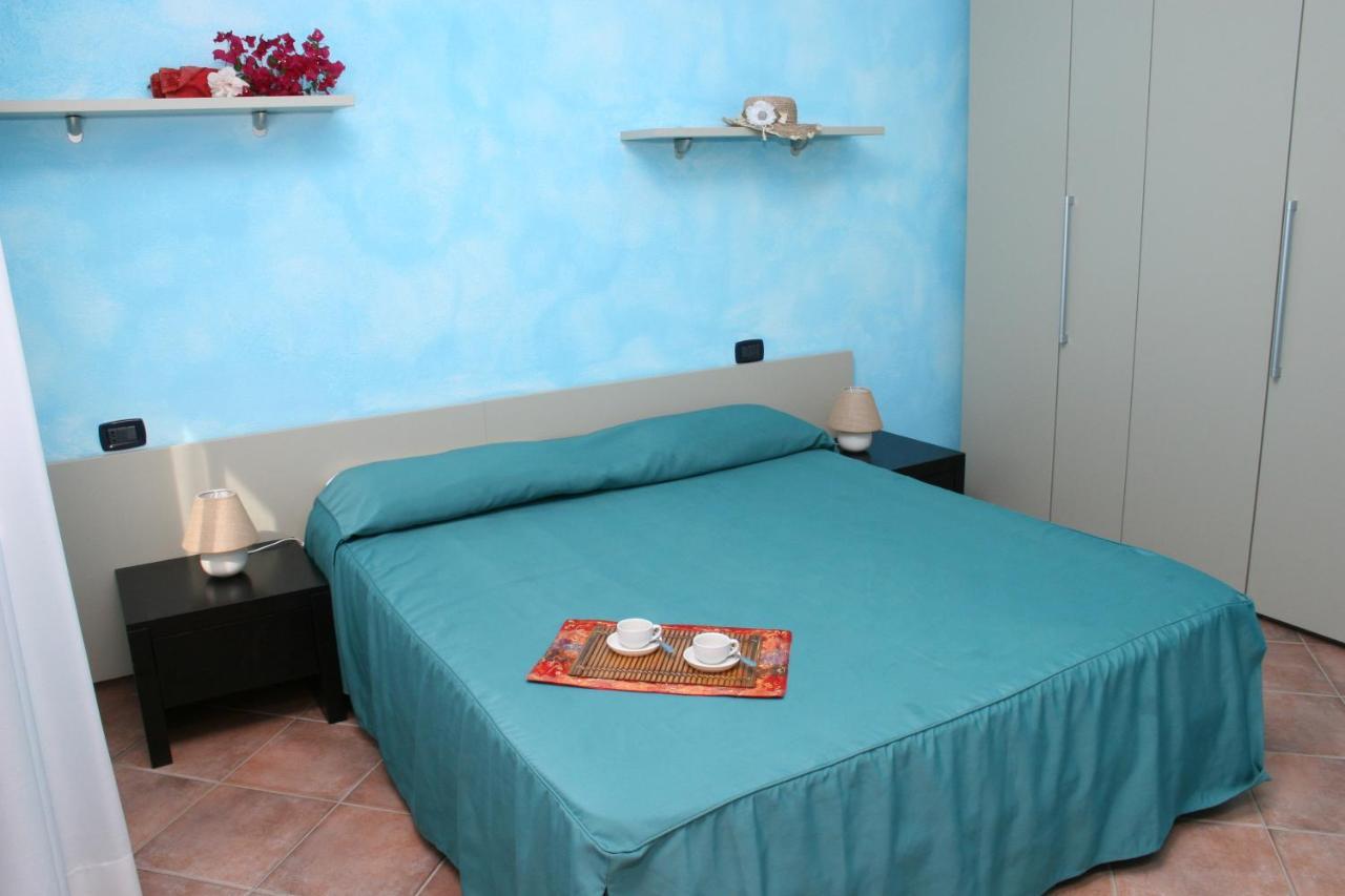 فيلابوتزو Residence Il Borgo Di Porto Corallo المظهر الخارجي الصورة