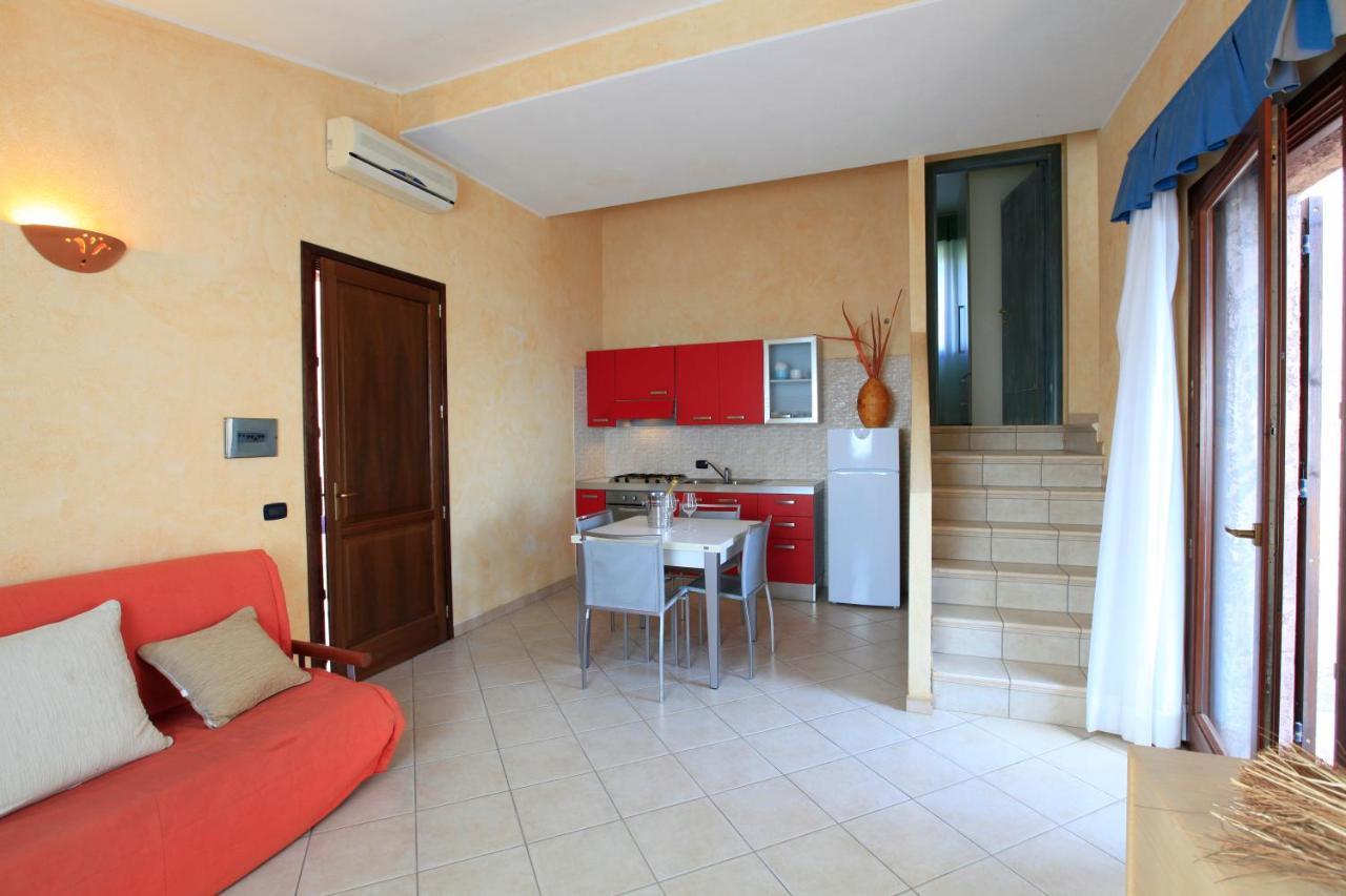 فيلابوتزو Residence Il Borgo Di Porto Corallo المظهر الخارجي الصورة
