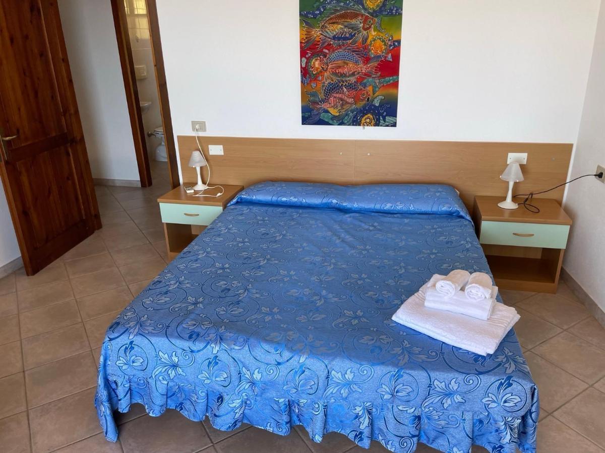 فيلابوتزو Residence Il Borgo Di Porto Corallo المظهر الخارجي الصورة